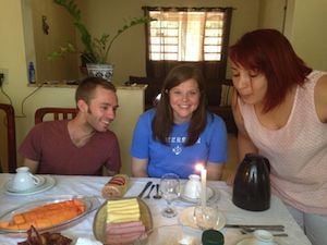 Krista and Taylor Smythe (left) visiting with a Brazilian host home.